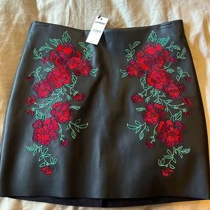 Express size 2 black mini skirt tags still on !